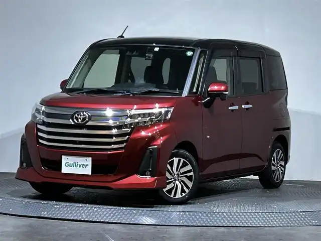 トヨタ ルーミー カスタムG 愛媛県 2022(令4)年 0.4万km ブラックマイカメタリック/ファイアークォーツレッドメタリック スマートアシスト　レーダークルーズコントロール　純正SDナビ　Bluetooth　CD　DVD　フルセグ　SD　全周囲カメラ　両側パワースライドドア　シートヒーター　ステアリングリモコン　アイドリングストップ　ドライブレコーダー　LEDヘッドライト　