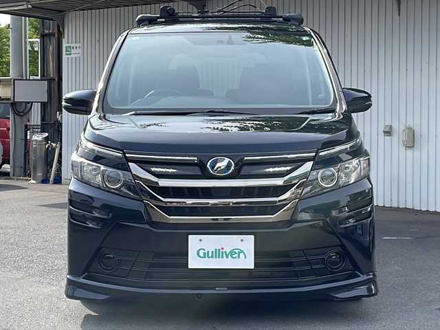 トヨタ ヴォクシー ハイブリッド X 愛知県 2014(平26)年 12.4万km ブラッキッシュアゲハガラスフレーク (株)IDOMが運営する【じしゃロン名古屋鳴海店】の自社ローン専用車両になりますこちらは現金またはオートローンご利用時の価格です。自社ローンご希望の方は別途その旨お申付け下さい/純正9インチナビフルセグTV/バックカメラ/ETC/両側パワースライドドア/社外17インチアルミ/社外アルミ冬タイヤ積込/保証書/スペアキー