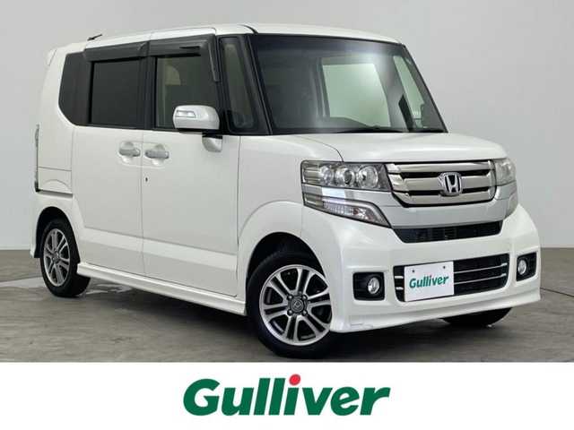 ホンダ Ｎ ＢＯＸ カスタム G Lパッケージ 大分県 2017(平29)年 10.4万km プレミアムホワイトパールⅡ 社外ナビ/フルセグ/DVD/Bluetooth/バックカメラ/オートキセノンライト/ビルトインETC/片側パワスラ/リアサンシェイド/社外シートカバー/社外フロアマット/純正14インチAW/スマートキー