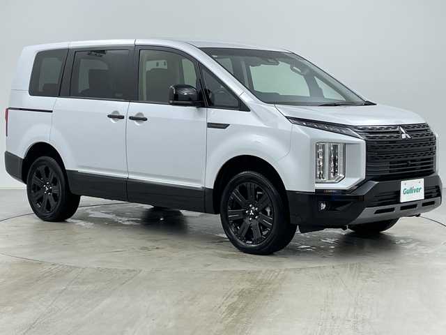 三菱 デリカＤ：５ シャモニー 道央・札幌 2025(令7)年 0.1千km 白Ⅱ ・登録済未使用車/・ALPINEナビ&CD&DVD&BT&SD&HDMI&USB&TV/・パワーバックドア/・両側パワースライドドア/・12.8型ALPINEフリップダウンモニター/・バック/サイド/フロントカメラ/・e-Assist/・レーダークルーズコントロール/・ブラインドスポットモニター/・D席パワーシート/・ハーフレザーシート/・ステアリングヒーター/・ステアリングスイッチ/・パドルシフト/・LEDヘッドライト/・オートライト/・オートマチックハイビーム/・スマートキー/・スペアキー/・保証書/・取扱説明書