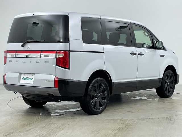 三菱 デリカＤ：５ シャモニー 道央・札幌 2025(令7)年 0.1千km 白Ⅱ ・登録済未使用車/・ALPINEナビ&CD&DVD&BT&SD&HDMI&USB&TV/・パワーバックドア/・両側パワースライドドア/・12.8型ALPINEフリップダウンモニター/・バック/サイド/フロントカメラ/・e-Assist/・レーダークルーズコントロール/・ブラインドスポットモニター/・D席パワーシート/・ハーフレザーシート/・ステアリングヒーター/・ステアリングスイッチ/・パドルシフト/・LEDヘッドライト/・オートライト/・オートマチックハイビーム/・スマートキー/・スペアキー/・保証書/・取扱説明書