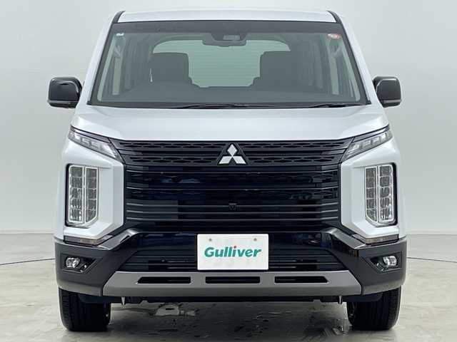 三菱 デリカＤ：５ シャモニー 道央・札幌 2025(令7)年 0.1千km 白Ⅱ ・登録済未使用車/・ALPINEナビ&CD&DVD&BT&SD&HDMI&USB&TV/・パワーバックドア/・両側パワースライドドア/・12.8型ALPINEフリップダウンモニター/・バック/サイド/フロントカメラ/・e-Assist/・レーダークルーズコントロール/・ブラインドスポットモニター/・D席パワーシート/・ハーフレザーシート/・ステアリングヒーター/・ステアリングスイッチ/・パドルシフト/・LEDヘッドライト/・オートライト/・オートマチックハイビーム/・スマートキー/・スペアキー/・保証書/・取扱説明書