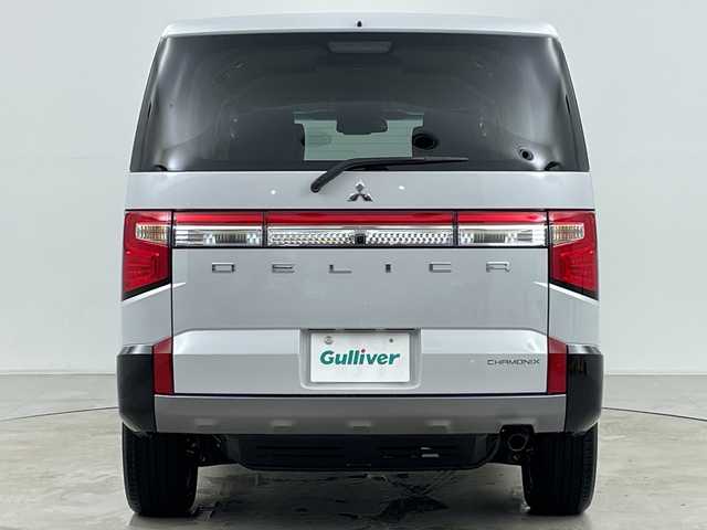 三菱 デリカＤ：５ シャモニー 道央・札幌 2025(令7)年 0.1千km 白Ⅱ ・登録済未使用車/・ALPINEナビ&CD&DVD&BT&SD&HDMI&USB&TV/・パワーバックドア/・両側パワースライドドア/・12.8型ALPINEフリップダウンモニター/・バック/サイド/フロントカメラ/・e-Assist/・レーダークルーズコントロール/・ブラインドスポットモニター/・D席パワーシート/・ハーフレザーシート/・ステアリングヒーター/・ステアリングスイッチ/・パドルシフト/・LEDヘッドライト/・オートライト/・オートマチックハイビーム/・スマートキー/・スペアキー/・保証書/・取扱説明書