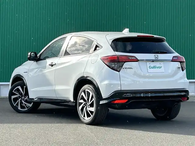 ホンダ ヴェゼル ハイブリッド RS ホンダセンシング 宮城県 2020(令2)年 7.4万km プラチナホワイトパール ホンダセンシング/●衝突軽減ブレーキ〈CMBS〉/●誤発進抑制機能/●歩行者事故低減ステアリング/●路外逸脱抑制機能/●ACC〈アダプティブ・クルーズ・コントロール〉/●LKAS〈車線維持支援システム〉/●先行車発進お知らせ機能/●標識認識機能/純正8インチナビ（VXM-207VFEi）/・CD/DVD/・Bluetooth/・USB/HDMI/・フルセグTV/バックカメラ/ビルトインETC/ドライブレコーダー/コンフォートビューパッケージ/●親水/ヒーテッドドアミラー/●フロントドア撥水ガラス/●熱線入りフロントウインドウ/ハーフレザーシート/シートヒーター/革巻きステアリング/ステアリングスイッチ/パドルシフト/電動パーキングブレーキ/ブレーキホールド/LEDヘッドランプ/フォグランプ/オートライト/スマートキー＆プッシュスタート/純正18インチAW/純正フロアマット/トノカバー/W/サイド/カーテンエアバッグ