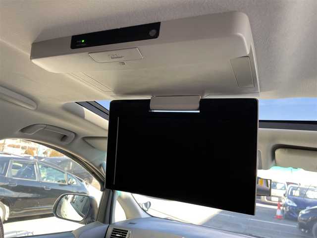 トヨタ アルファード 240S タイプゴールドⅡ 東京都 2014(平26)年 7.7万km ホワイトパールクリスタルシャイン 純正ナビ/純正フリップダウンモニター/バックカメラ/フルセグTV/フロント/リアモデリスタスポイラー/ETC/ツインムーンルーフ/両側電動スライドドア/パワーバックドア/ハーフレザーシート/前方ドライブレコーダー/横滑り防止装置/純正フロアマット/サイドバイザー/クルーズコントロール/スマートキー/オットマン/社外20インチAW