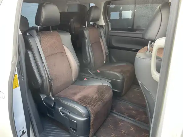 トヨタ アルファード 240S タイプゴールドⅡ 東京都 2014(平26)年 7.7万km ホワイトパールクリスタルシャイン 純正ナビ/純正フリップダウンモニター/バックカメラ/フルセグTV/フロント/リアモデリスタスポイラー/ETC/ツインムーンルーフ/両側電動スライドドア/パワーバックドア/ハーフレザーシート/前方ドライブレコーダー/横滑り防止装置/純正フロアマット/サイドバイザー/クルーズコントロール/スマートキー/オットマン/社外20インチAW