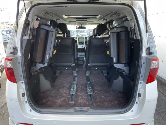 トヨタ アルファード 240S タイプゴールドⅡ 東京都 2014(平26)年 7.7万km ホワイトパールクリスタルシャイン 純正ナビ/純正フリップダウンモニター/バックカメラ/フルセグTV/フロント/リアモデリスタスポイラー/ETC/ツインムーンルーフ/両側電動スライドドア/パワーバックドア/ハーフレザーシート/前方ドライブレコーダー/横滑り防止装置/純正フロアマット/サイドバイザー/クルーズコントロール/スマートキー/オットマン/社外20インチAW