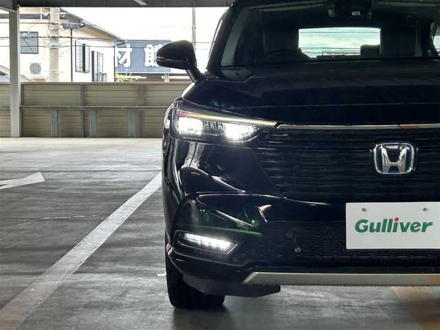 ホンダ ヴェゼル ハイブリッド e:HEV Z 愛知県 2022(令4)年 3.3万km クリスタルブラックパール ホンダセンシング/純正8インチSDナビ/・フルセグ/CD/DVD/USB/バックカメラ/ビルトインETC/クルーズコントロール追従有/ブラインドスポットインフォメーション/ハーフレザーシート/シートカバー/シートヒーターD/N/革巻きステアリング/オートライト/スマートキー/・プッシュスタート/LEDヘッドライト/・フォグランプ/電動格納ミラー/ウインカーミラー/純正アルミホイール/純正フロアマット/純正ドアバイザー/トノーカバー