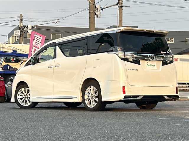 トヨタ ヴェルファイア Z 愛知県 2016(平28)年 11.3万km ホワイトパールクリスタルシャイン /モデリスタエアロキット//フロントスポイラー/サイドスカート/リヤスカート/スポーツマフラー//モデリスタフロントフェイスグリルキット//フロントグリル(LED付)/フードガーニッシュ//純正グリル(車載)//社外スタッドレス(車載) 225/60/R17//ディーラーナビ(NSZN-Z66T)//フルセグTV/BT/SD/CD/DVD//純正フリップダウンモニター(V12T-R66C)//スペアスマートキー//両側パワースライドドア//純正フロアマット//純正エントランスマット//純正ドアバイザー//オートHIDヘッドライト//フォグランプ//横滑り防止装置//クリアランスソナー//ECO MODE//ナノイー搭載エアコン//ムードランプ//レザーステアリング//ステアリングスイッチ//保証書//取扱説明書