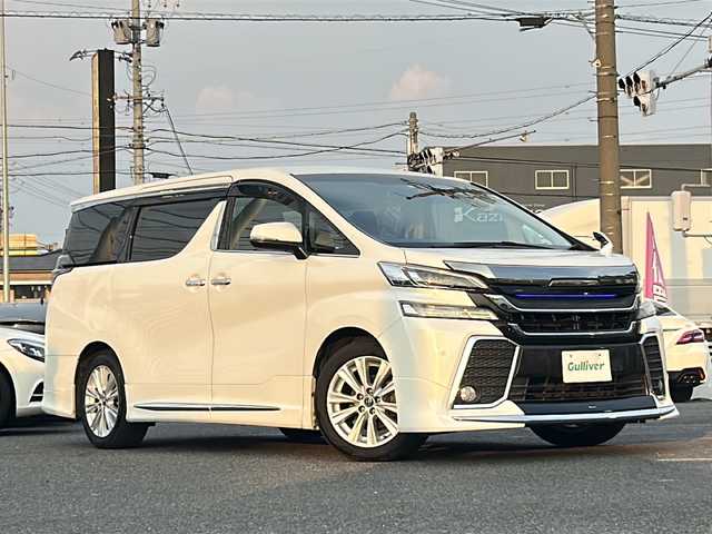 トヨタ ヴェルファイア Z 愛知県 2016(平28)年 11.3万km ホワイトパールクリスタルシャイン /モデリスタエアロキット//フロントスポイラー/サイドスカート/リヤスカート/スポーツマフラー//モデリスタフロントフェイスグリルキット//フロントグリル(LED付)/フードガーニッシュ//純正グリル(車載)//社外スタッドレス(車載) 225/60/R17//ディーラーナビ(NSZN-Z66T)//フルセグTV/BT/SD/CD/DVD//純正フリップダウンモニター(V12T-R66C)//スペアスマートキー//両側パワースライドドア//純正フロアマット//純正エントランスマット//純正ドアバイザー//オートHIDヘッドライト//フォグランプ//横滑り防止装置//クリアランスソナー//ECO MODE//ナノイー搭載エアコン//ムードランプ//レザーステアリング//ステアリングスイッチ//保証書//取扱説明書