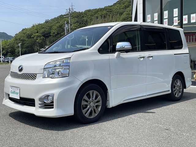 トヨタ ヴォクシー ZS 煌Ⅲ 兵庫県 2012(平24)年 7.3万km パール 純正ナビ/・BT/・フルセグTV/・CD/DVD/バックカメラ/LEDライト/純正ドアバイザー/パドルシフト/ハーフレザーシート/純正フロアマット/ミラーウインカー/両側パワースライドドア/ETC