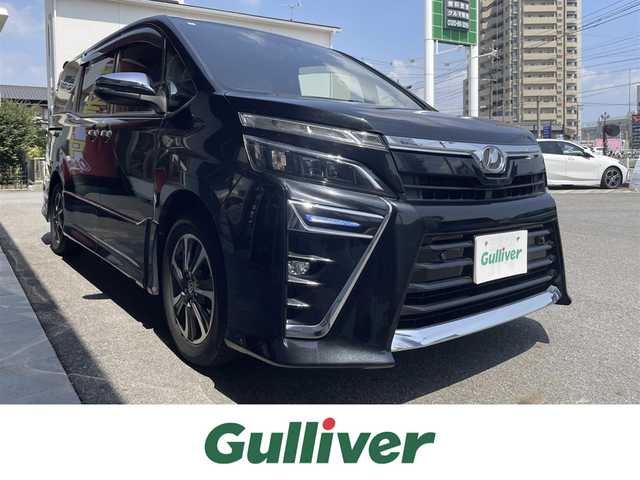 トヨタ ヴォクシー ZS 煌Ⅱ 大分県 2019(令1)年 5.7万km ブラック 純正メモリナビ/(CD/DVD/BT/フルセグTV)/バックカメラ/フリップダウンモニター/両側パワースライドドア /トヨタセーフティセンス/スマートキー/プッシュスタート/ETC/電格ミラー/ウィンカーミラー/オートライト/オートハイビーム/フォグランプ/LEDヘッドライト