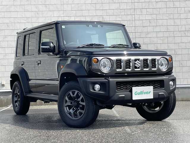 スズキ ジムニー ノマド FC 富山県 2025(令7)年 0.1万km 黒  4WD/ セーフティサポート/・　デュアルカメラブレーキサポート/・　誤発進抑制機能/・　後退時ブレーキサポート/・　後方誤発進抑制機能/・　車線逸脱警報/・　アダプティブクルーズコントロール/・　ハイビームアシスト/・　標識認識機能/・　ふらつき警報/・　先行車発進お知らせ機能/ D/N席シートヒーター/ LEDヘッドライト/・　ヘッドランプウォッシャー/ フォグライト/・　電動オート格納機能/・　ヒーター/ 純正15インチアルミホイール/ 背面タイヤハーフカバー/ 撥水加工ファブリックシート