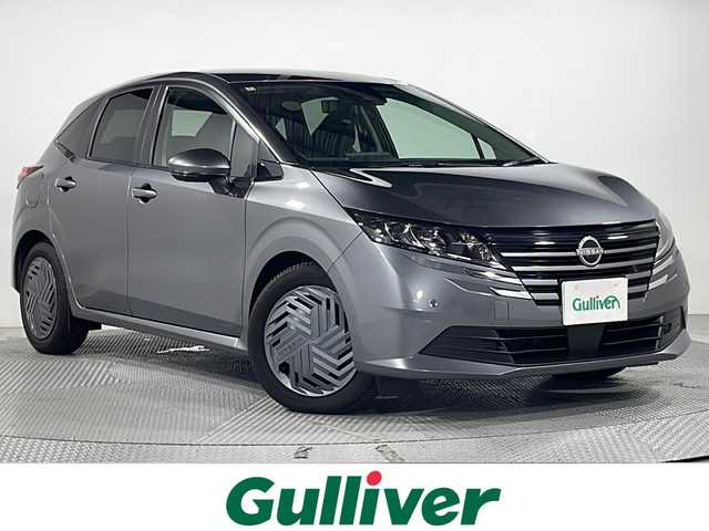 日産 ノート X 広島県 2024(令6)年 0.3万km ダークメタルグレー 禁煙車/純正ナビ/アラウンドビューモニター/インテリジェントルームミラー/プロパイロット/ブラインドスポットモニター/オートホールド付電動パーキングブレーキ/アダブティブヘッドライト/衝突軽減/レーンキープ/ハンドル支援/踏み間違い防止/ヘッドライトレベライザー/エアバッグ(運転席/助手席)/純正16インチホイールキャップ(185/60/R16)
