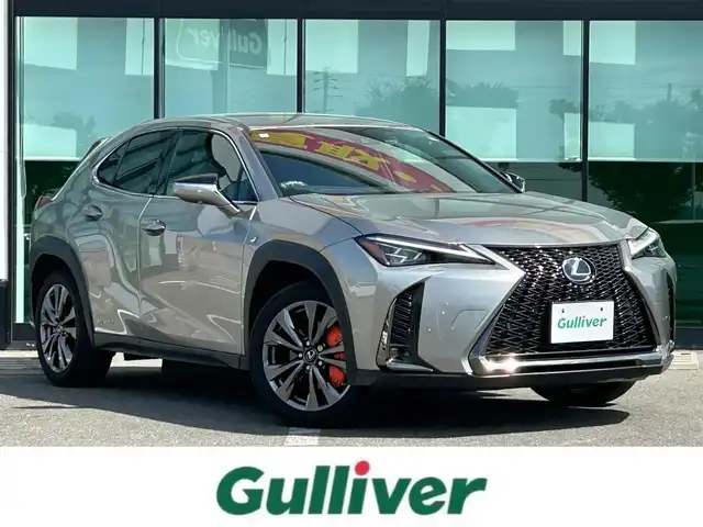 レクサス ＵＸ 250h Fスポーツ 和歌山県 2021(令3)年 6.8万km ソニックチタニウム オレンジキャリパー/純正12.3インチナビ/全方位カメラ/フルセグTV/BT/衝突軽減ブレーキ/ブラインドスポットモニター/前後コーナーセンサー/オートライト/レーダークルコン/ドラレコ/ETC/シートヒーター/ステアリングヒーター/ステアリングリモコン/シートメモリー/パドルシフト/電動リアゲート/3眼LEDヘッドライト/フォグランプ