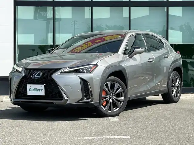レクサス ＵＸ 250h Fスポーツ 和歌山県 2021(令3)年 6.8万km ソニックチタニウム オレンジキャリパー/純正12.3インチナビ/全方位カメラ/フルセグTV/BT/衝突軽減ブレーキ/ブラインドスポットモニター/前後コーナーセンサー/オートライト/レーダークルコン/ドラレコ/ETC/シートヒーター/ステアリングヒーター/ステアリングリモコン/シートメモリー/パドルシフト/電動リアゲート/3眼LEDヘッドライト/フォグランプ