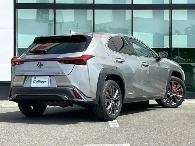 レクサス ＵＸ 250h Fスポーツ 和歌山県 2021(令3)年 6.8万km ソニックチタニウム オレンジキャリパー/純正12.3インチナビ/全方位カメラ/フルセグTV/BT/衝突軽減ブレーキ/ブラインドスポットモニター/前後コーナーセンサー/オートライト/レーダークルコン/ドラレコ/ETC/シートヒーター/ステアリングヒーター/ステアリングリモコン/シートメモリー/パドルシフト/電動リアゲート/3眼LEDヘッドライト/フォグランプ