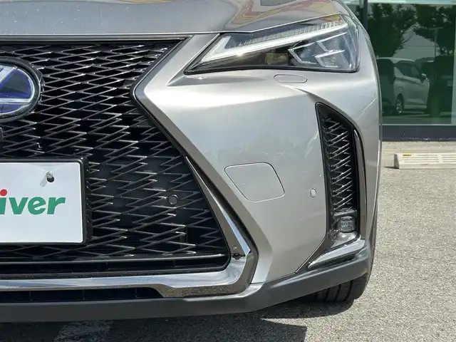 レクサス ＵＸ 250h Fスポーツ 和歌山県 2021(令3)年 6.8万km ソニックチタニウム オレンジキャリパー/純正12.3インチナビ/全方位カメラ/フルセグTV/BT/衝突軽減ブレーキ/ブラインドスポットモニター/前後コーナーセンサー/オートライト/レーダークルコン/ドラレコ/ETC/シートヒーター/ステアリングヒーター/ステアリングリモコン/シートメモリー/パドルシフト/電動リアゲート/3眼LEDヘッドライト/フォグランプ