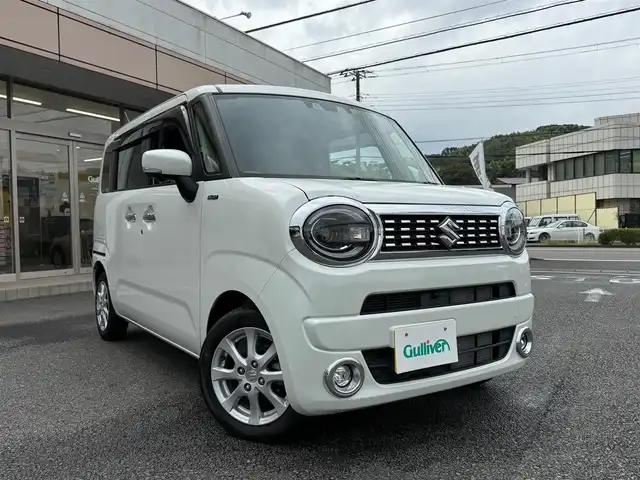 スズキ ワゴンＲ スマイル HYBRID X 静岡県 2022(令4)年 0.9万km ピュアホワイトP ワンオーナー・保証書/走行8916キロ（登録時）/マイルドハイブリット/アイドリングストップシステム/セーフティサポート/両側パワースライドドア/純正9型メモリーナビ/地デジTV/DVD再生/CD/Bluetoothオーディオ/ステアリングスイッチ/全方位カメラ/LEDヘッドランプ/LEDフォグランプ/ウィンカードアミラー/D席シートヒーター/メッキドアハンドル/純正14インチアルミ/スマートキー×2/プッシュスタート/パーソナルテーブル（D席背面）/純正フロアマット/純正ワイドドアバイザー/オートエアコン/WエアB＋サイドエアB/車両取説＋ナビ取説あり