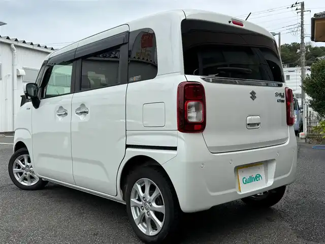 スズキ ワゴンＲ スマイル HYBRID X 静岡県 2022(令4)年 0.9万km ピュアホワイトP ワンオーナー・保証書/走行8916キロ（登録時）/マイルドハイブリット/アイドリングストップシステム/セーフティサポート/両側パワースライドドア/純正9型メモリーナビ/地デジTV/DVD再生/CD/Bluetoothオーディオ/ステアリングスイッチ/全方位カメラ/LEDヘッドランプ/LEDフォグランプ/ウィンカードアミラー/D席シートヒーター/メッキドアハンドル/純正14インチアルミ/スマートキー×2/プッシュスタート/パーソナルテーブル（D席背面）/純正フロアマット/純正ワイドドアバイザー/オートエアコン/WエアB＋サイドエアB/車両取説＋ナビ取説あり