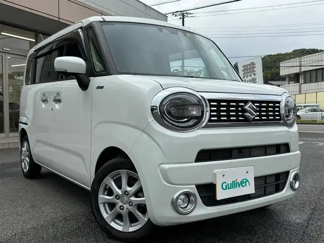 スズキ ワゴンＲ スマイル HYBRID X 静岡県 2022(令4)年 0.9万km ピュアホワイトP ワンオーナー・保証書/走行8916キロ（登録時）/マイルドハイブリット/アイドリングストップシステム/セーフティサポート/両側パワースライドドア/純正9型メモリーナビ/地デジTV/DVD再生/CD/Bluetoothオーディオ/ステアリングスイッチ/全方位カメラ/LEDヘッドランプ/LEDフォグランプ/ウィンカードアミラー/D席シートヒーター/メッキドアハンドル/純正14インチアルミ/スマートキー×2/プッシュスタート/パーソナルテーブル（D席背面）/純正フロアマット/純正ワイドドアバイザー/オートエアコン/WエアB＋サイドエアB/車両取説＋ナビ取説あり