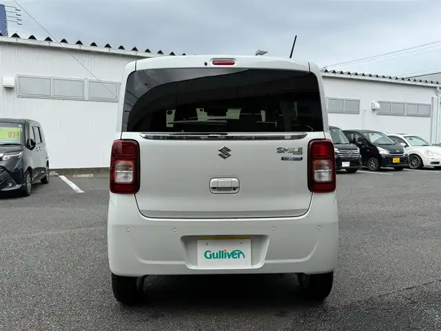 スズキ ワゴンＲ スマイル HYBRID X 静岡県 2022(令4)年 0.9万km ピュアホワイトP ワンオーナー・保証書/走行8916キロ（登録時）/マイルドハイブリット/アイドリングストップシステム/セーフティサポート/両側パワースライドドア/純正9型メモリーナビ/地デジTV/DVD再生/CD/Bluetoothオーディオ/ステアリングスイッチ/全方位カメラ/LEDヘッドランプ/LEDフォグランプ/ウィンカードアミラー/D席シートヒーター/メッキドアハンドル/純正14インチアルミ/スマートキー×2/プッシュスタート/パーソナルテーブル（D席背面）/純正フロアマット/純正ワイドドアバイザー/オートエアコン/WエアB＋サイドエアB/車両取説＋ナビ取説あり