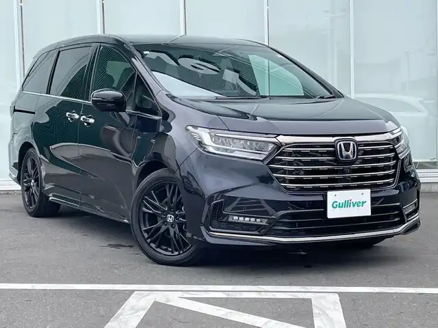 ホンダ オデッセイ ハイブリッド e:HEVアブソルート 神奈川県 2023(令5)年 2.9万km プレミアムヴィーナスブラックP 純正９型ＳＤナビ（LXM-247VFNi）/Bluetooth/CD/DVD/USB/フルセグ/パワースライドドア/電動リアゲート/全周囲カメラ/追従式クルーズコントロール/オートブレーキホールド/パワーシート/全席シートヒーター/ワイヤレス充電/パドルシフト/ＬＥＤヘッドライト/フロントフォグランプ/純正アルミホイール/ビルドインＥＴＣ/前後コーナーセンサー/横滑り防止装置/レーンキープアシスト/盗難防止装置