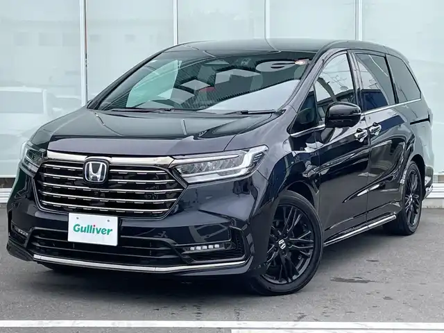 ホンダ オデッセイ ハイブリッド e:HEVアブソルート 神奈川県 2023(令5)年 2.9万km プレミアムヴィーナスブラックP 純正９型ＳＤナビ（LXM-247VFNi）/Bluetooth/CD/DVD/USB/フルセグ/パワースライドドア/電動リアゲート/全周囲カメラ/追従式クルーズコントロール/オートブレーキホールド/パワーシート/全席シートヒーター/ワイヤレス充電/パドルシフト/ＬＥＤヘッドライト/フロントフォグランプ/純正アルミホイール/ビルドインＥＴＣ/前後コーナーセンサー/横滑り防止装置/レーンキープアシスト/盗難防止装置