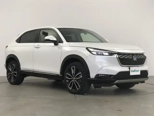 ホンダ ヴェゼル ハイブリッド e:HEV Z 愛知県 2022(令4)年 4.2万km プラチナホワイトパール ホンダセンシング/純正9型ナビ/・Bluetooth/・フルセグTV/・Applecarplay/・androidauto/メーカOPフロントグリル/メーカーOPゲートスポイラー/メーカーOPサイドガーニッシュ/アダプティブクルーズコントロール/ブラインドスポットモニター/Qi充電/パドルシフト/パワーバックドア/ETC2.0/バックカメラ/シートヒーター/ステアリングヒーター/純正AW/前後ドライブレコーダー