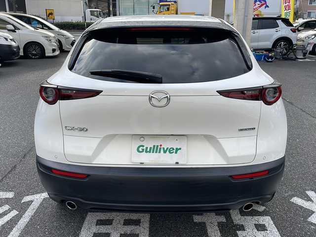 マツダ ＣＸ－３０ XD 100周年特別記念車 広島県 2020(令2)年 3.9万km スノーフレイクホワイトパールマイカ /登録時走行距離/　　　　　　　38146キロ/i-stop/純正ナビ/全方位モニター/地デジ/赤革シート/シートヒーター/クルーズコントロール/パワーバックドア/ステアヒーター/BOSEサウンドシステム/スペアキー×１/ETC/新車時整備手帳/　　【保証書】/取扱説明書/