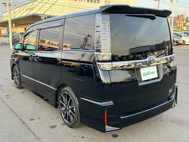 トヨタ ヴォクシー ZS GRスポーツ 岡山県 2019(平31)年 8.8万km ブラック 登録時走行距離87494km/ワンオーナー/ALPINEBIGX9インチナビ/（AM/FM/CD/DVD/TV/BT）/ダブルゾーン/ALPINE12.8インチフリップダウンモニター/両側パワースライドドア/バックカメラ/フロントカメラ/アイドリングストップ/トヨタセーフティセンス/・クルーズコントロール/・オートマチックハイビーム/・プリクラッシュセーフティ/・レーンディパーチャアラート/USB入力端子/HDMI入力端子/純正18インチアルミホイール/LEDヘッドライト/プッシュスタート/スペアタイヤ/取扱説明書/保証書