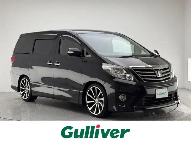 トヨタ アルファード 240S タイプゴールド 兵庫県 2013(平25)年 8.7万km ブラック ・社外SDナビ　（AVN‐ZX02i)/（CD/DVD/SD/Bluetooth/フルセグTV）　　/・社外フリップダウンモニター　/・コーナーセンサー　　/・クルーズコントロール　　/・バックカメラ　/・パワーバックドア　/・両側パワースライドドア　/・ダウンサス　/・ハーフレザーシート　/・ETC　/・純正マット/・純正ドアバイザー/・HID/・フォグランプ/・社外20インチAW