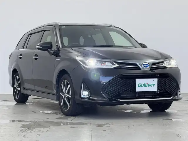 トヨタ カローラ フィールダー ハイブリッドG ダブルバイビー 愛知県 2018(平30)年 5.4万km ブラックマイカ Panasonicナビ　/（フルセグ／ＢＴ／ＣＤ／ＤＶＤ）　/クルーズコントロール　/バックモニター　/コーナーセンサー　/衝突軽減システム　/レーンキープアシスト　/ハーフレザーシート（ブラック）　/ＬＥＤヘッドライト　/電動格納ミラー　/オートライト　/純正ＡＷ