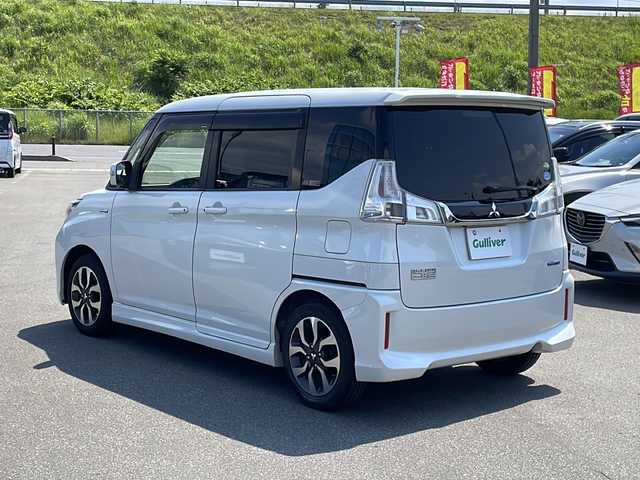 三菱 デリカＤ：２ カスタムHV　MV 青森県 2016(平28)年 12.5万km ピュアホワイトP ・４WD/・社外ナビ/（CD/DVD/フルセグ/Bluetooth）/・バックカメラ/・両側パワースライドドア/・衝突被害軽減システム/・レーンキープアシスト/・クルーズコントロール/・横滑り防止装置/・アイドリングストップ/・ロールサンシェード/・シートバックテーブル/・社外ナビ/（CD/DVD/フルセグ/Bluetooth）/・バックカメラ/・ETC/・オートエアコン/・オートライト/・LEDヘッドライト/・フォグランプ/・純正15インチアルミホイール/・ドアミラーウインカー
