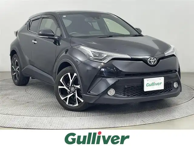 トヨタ Ｃ－ＨＲ G－T LEDエディション 道央・札幌 2018(平30)年 8.1万km ブラックマイカ ・４WD/・ワンオーナー/・寒冷地仕様/・純正SDナビ/・CD/DVD/SD/BT/・フルセグTV/・バックカメラ/・ビルトインETC/・ブラインドスポットモニター/・トヨタセーフティセンス/・プリクラッシュセーフティ/・レーンキープアシスト/・オートホールド/・レーダークルーズコントロール/・クリアランスソナー/・横滑り防止装置/・ステアリングスイッチ/・nanoe/・LEDヘッドライト/・フォグランプ/・オートライト/・オートマチックハイビーム/・ハーフレザーシート/・D+N席シートヒーター/純正18インチAW/純正フロアマット/プッシュスタート/スマートキー/スペアキー/・純正エンジンスターター/・保証書/・取扱説明書
