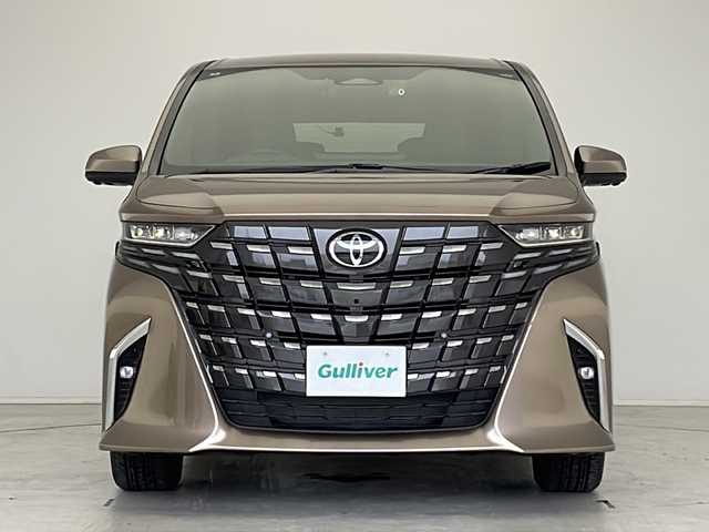 トヨタ アルファード Z 愛知県 2024(令6)年 0.5万km 茶 衝突軽減システム/純正１４型ディスプレイオーディオ（ナビあり）/フリップダウンモニター/三眼LEDヘッドライト/全方位カメラ/両側パワースライドドア/本革シート/レーダークルーズコントロール/シートヒーター/エアシート/フルセグ/Bluetooth/バックカメラ/電動リアゲート/パワーシート/コーナーセンサー/純正アルミホイール/ETC2.0/ブラインドスポットモニター/ステアリングヒーター/インテリジェントミラー/リアオートエアコン/置くだけ充電器/オートマチックハイビーム/ステアリングスイッチ/スマートキー/プッシュスタート