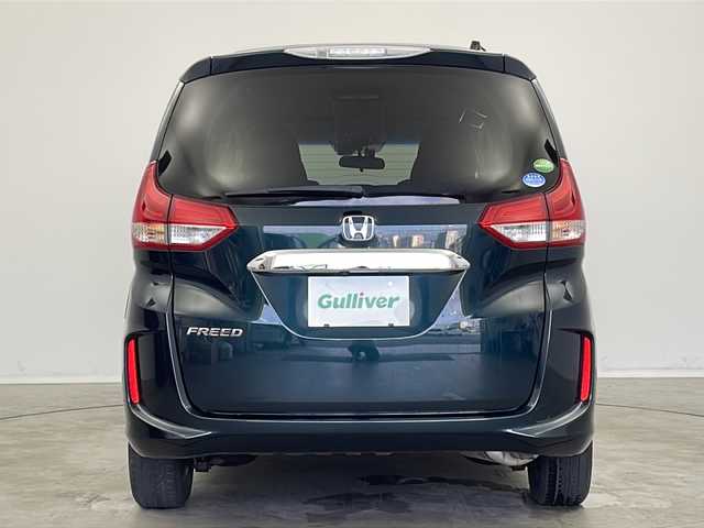 ホンダ フリード G ホンダセンシング 新潟県 2019(平31)年 1.8万km フォレストグリーンパール 純正SDナビ（Bluetooth・CD・DVD・USB）/両側パワースライドドア/純正フリップダウンモニター　/バックカメラ　/フルセグ　/衝突被害軽減システム/レーンキープアシスト　/追従クルーズコントロール　/LEDオートライト　/オートマチックハイビーム　/前方ドライブレコーダー/アイドリングストップ/フロントワイパーデアイサー/ステアリングスイッチ/ETC/純正フロアマット/純正１５インチアルミホイール/スマートキー/スペアキー