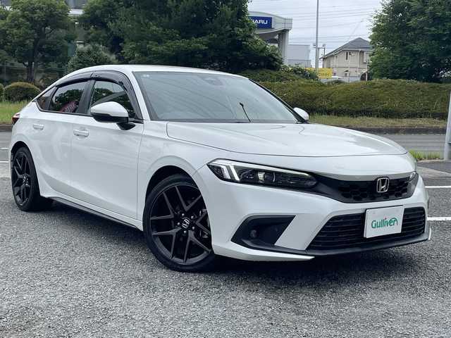 ホンダ シビック EX 神奈川県 2021(令3)年 4.3万km プラチナホワイトパール 純正ナビ/・フルセグTV/BT/バックカメラ/ビルトインETC2.0/純正前後ドライブレコーダー/ワイヤレス充電/ホンダセンシング/コーナーセンサー/ACC/ハーフレザーシート/・前席パワーシート/シートヒーター/純正18インチAW/LEDヘッドライト/LEDフォグランプ/アイドリングストップ機能/スマートキー/パドルシフト/ドアバイザー/純正フロアマット/スペアキー×1