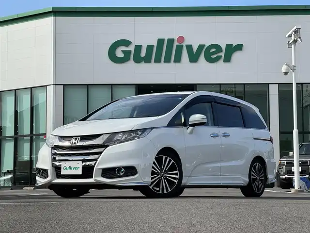 ホンダ オデッセイ アブソルート EX 兵庫県 2014(平26)年 7.3万km ホワイトオーキッドパール 登録時走行距離：72226km/ディーラーOP純正ナビ/AM/FM/フルセグTV/DVD/CD/サンシェード/後席モニター/パドルシフト/ハーフレザー/前ドラレコ/ビルトインETC/バックカメラ/クルコン/衝突軽減システム/横滑り防止装置/LEDヘッドライト/フォグランプ/オートライト/エンジンスタートボタン/スペアキー/純正アルミホイール/純正フロアマット