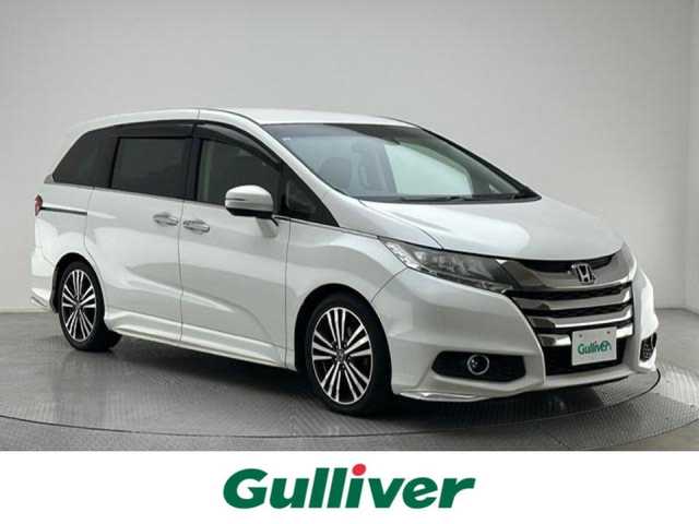 ホンダ オデッセイ アブソルート EX 兵庫県 2014(平26)年 7.3万km ホワイトオーキッドパール 登録時走行距離：72226km/ディーラーOP純正ナビ/AM/FM/フルセグTV/DVD/CD/サンシェード/後席モニター/パドルシフト/ハーフレザー/前ドラレコ/ビルトインETC/バックカメラ/クルコン/衝突軽減システム/横滑り防止装置/LEDヘッドライト/フォグランプ/オートライト/エンジンスタートボタン/スペアキー/純正アルミホイール/純正フロアマット