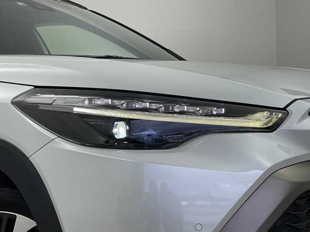 トヨタ カローラ クロス ハイブリッド Z 新潟県 2022(令4)年 4.9万km プラチナホワイトパールマイカ ４WD/純正ディスプレイオーディオ/（BT/FM/AM/フルセグTV）/バックカメラ/ステアリングスイッチ/パワーシート/ハーフレザーシート/シートヒーター/電動リアゲート/TVキャンセラー/シーケンシャルウィンカー/電格ミラー/純正LEDオートヘッドライト/フロントフォグライト/ヘッドライトレベライザー/電格ミラー/ETC