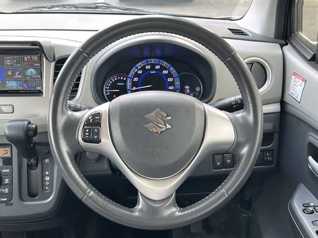 スズキ ワゴンＲ FZ 鳥取県 2014(平26)年 5.2万km クリスタルホワイトP ワンオーナー/プリクラッシュ/フルタイム４WD/スマートキーx2個/前席シートヒーター/純正エアロ/純正14インチAW/社外メモリナビ/ワンセグ・USB/革巻ステアリング/アイドリングストップ/オートエアコン/ETC/保証書・取説