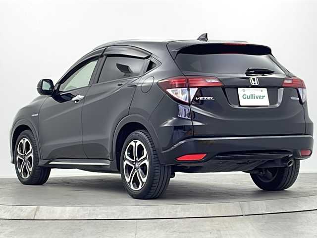 ホンダ ヴェゼル ハイブリッド Z ホンダセンシング 大阪府 2017(平29)年 5.9万km クリスタルブラックパール 純正8型ナビ(フルセグTV/HDMI/USB/CD/DVD)/リンクアップフリー/バックカメラ/ETC/ルーフレール/Honda SENSING/・衝突軽減ブレーキ/・誤発信抑制機能/・歩行者事故低減ステアリング/・路外逸脱抑制機能/・アダブティブ・クルーズ・コントロール/・車線維持支援システム/・先行車発信お知らせ機能/・標識認識機能/オートライト/盗難防止装置/ハーフレザーシート/シートヒーター(D/N席)/純正フロアマット/純正AW/スペアキー/地図カードなし/取扱説明書/保証書