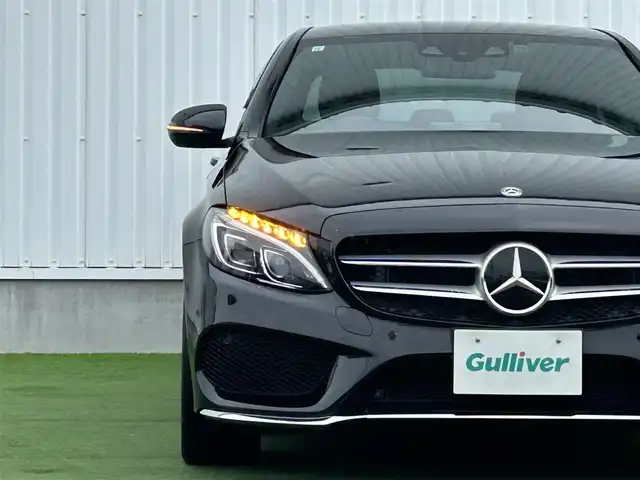 メルセデス・ベンツ Ｃ２００ アバンギャルド AMGライン 香川県 2017(平29)年 2.1万km 黒 ワンオーナー/純正SDナビ/(BT/DVD/フルセグTV)/バックカメラ/アクティブディスタンスアシストディストロニック/パドルシフト/革巻きステアリング/ブラインドスポットモニター/レザーシート/メモリー付きパワーシート/シートヒーター/LEDヘッドライト/オートライト/純正18インチアルミ/革巻きステアリング/レーンキープアシスト/ISOTIX/Wサイド、カーテンエアバック/取扱説明書/プッシュスタート/スペアキー有(1本)