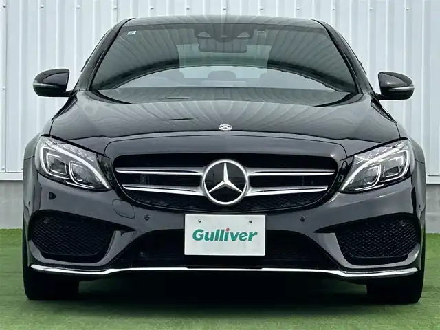 メルセデス・ベンツ Ｃ２００ アバンギャルド AMGライン 香川県 2017(平29)年 2.1万km 黒 ワンオーナー/純正SDナビ/(BT/DVD/フルセグTV)/バックカメラ/アクティブディスタンスアシストディストロニック/パドルシフト/革巻きステアリング/ブラインドスポットモニター/レザーシート/メモリー付きパワーシート/シートヒーター/LEDヘッドライト/オートライト/純正18インチアルミ/革巻きステアリング/レーンキープアシスト/ISOTIX/Wサイド、カーテンエアバック/取扱説明書/プッシュスタート/スペアキー有(1本)