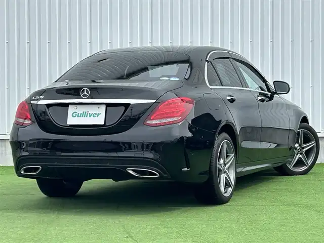 メルセデス・ベンツ Ｃ２００ アバンギャルド AMGライン 香川県 2017(平29)年 2.1万km 黒 ワンオーナー/純正SDナビ/(BT/DVD/フルセグTV)/バックカメラ/アクティブディスタンスアシストディストロニック/パドルシフト/革巻きステアリング/ブラインドスポットモニター/レザーシート/メモリー付きパワーシート/シートヒーター/LEDヘッドライト/オートライト/純正18インチアルミ/革巻きステアリング/レーンキープアシスト/ISOTIX/Wサイド、カーテンエアバック/取扱説明書/プッシュスタート/スペアキー有(1本)