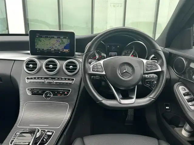 メルセデス・ベンツ Ｃ２００ アバンギャルド AMGライン 香川県 2017(平29)年 2.1万km 黒 ワンオーナー/純正SDナビ/(BT/DVD/フルセグTV)/バックカメラ/アクティブディスタンスアシストディストロニック/パドルシフト/革巻きステアリング/ブラインドスポットモニター/レザーシート/メモリー付きパワーシート/シートヒーター/LEDヘッドライト/オートライト/純正18インチアルミ/革巻きステアリング/レーンキープアシスト/ISOTIX/Wサイド、カーテンエアバック/取扱説明書/プッシュスタート/スペアキー有(1本)