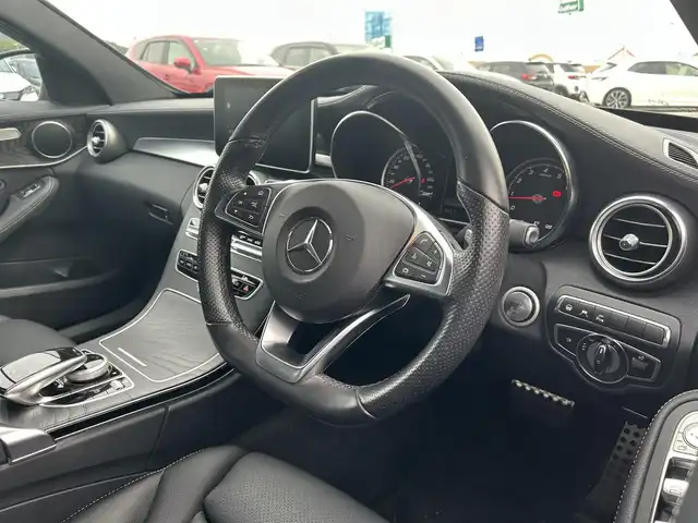 メルセデス・ベンツ Ｃ２００ アバンギャルド AMGライン 香川県 2017(平29)年 2.1万km 黒 ワンオーナー/純正SDナビ/(BT/DVD/フルセグTV)/バックカメラ/アクティブディスタンスアシストディストロニック/パドルシフト/革巻きステアリング/ブラインドスポットモニター/レザーシート/メモリー付きパワーシート/シートヒーター/LEDヘッドライト/オートライト/純正18インチアルミ/革巻きステアリング/レーンキープアシスト/ISOTIX/Wサイド、カーテンエアバック/取扱説明書/プッシュスタート/スペアキー有(1本)
