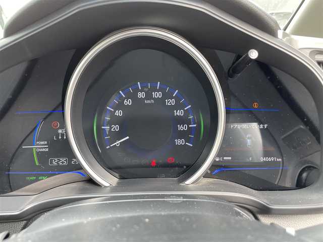 ホンダ フィット ハイブリット Lパッケージ 滋賀県 2013(平25)年 4.1万km ブリリアントスポーティブルーメタリック2トーン 純正ナビ　Bluetooth/CD/DVD/USB/HDMI/バックカメラ/クルーズコントロール/LEDヘッドライト/ビルトインETC/ドライブレコーダー（前方）/ステアリングスイッチ/ハーフレザーシート/合皮シートカバー/ドアバイザー/プッシュスタート/スマートキー/純正フロアマット