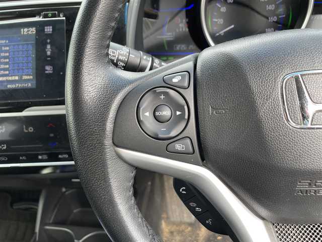 ホンダ フィット ハイブリット Lパッケージ 滋賀県 2013(平25)年 4.1万km ブリリアントスポーティブルーメタリック2トーン 純正ナビ　Bluetooth/CD/DVD/USB/HDMI/バックカメラ/クルーズコントロール/LEDヘッドライト/ビルトインETC/ドライブレコーダー（前方）/ステアリングスイッチ/ハーフレザーシート/合皮シートカバー/ドアバイザー/プッシュスタート/スマートキー/純正フロアマット